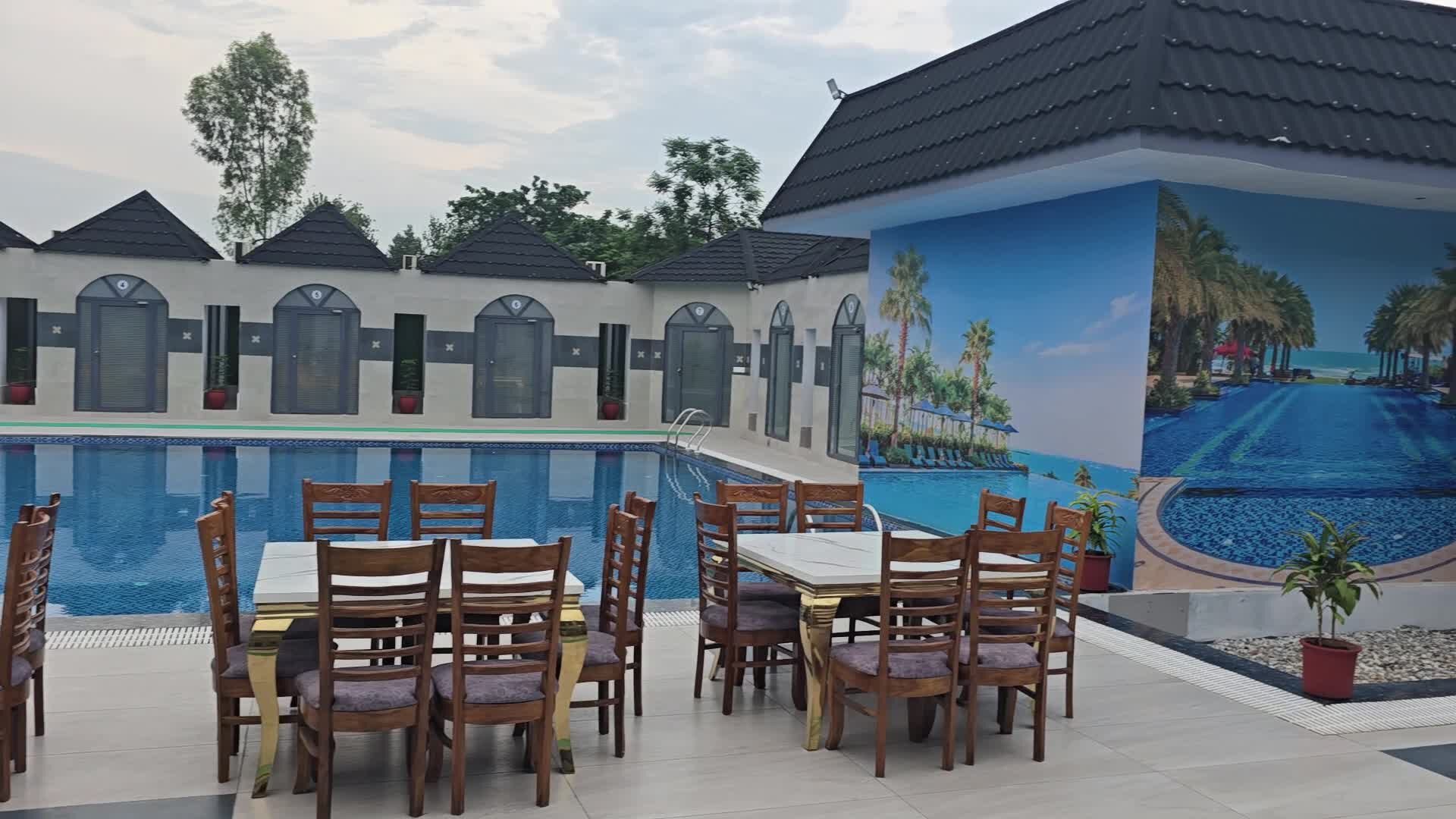 Pool with cabana rooms